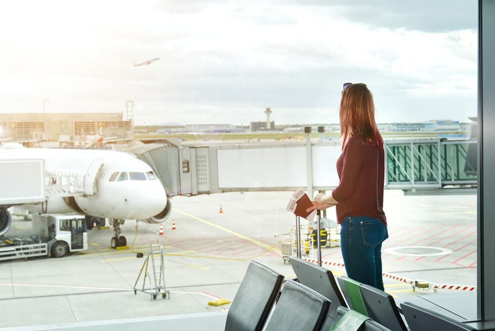 Boardwalk Resort Vacations Reviews shows a traveler at the airport while reviewing practical airline reservation considerations.